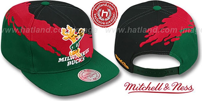 red and green baseball caps