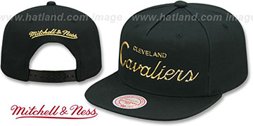 Cavaliers LIQUID METALLIC SCRIPT SNAPBACK Black-Gold Hat by Mitchell and Ness
